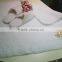 cotton bath rug hand tuffted with embroidered logo