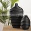 Support customized wholesale cheap unique handmade design black wine bottle shape resin vase