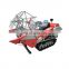 Self-propelled wheat and rice tracked type combine harvester for paddy and dry field