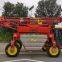 Huaxi 3WPZ-2000G self-propelled spray boom pesticide applicator corn spraying machine manufacturer