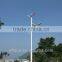 Alternative energy low rotation wind turbine integrated solar street light