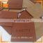 customized bulk debossed logo genuine leather labels for bags