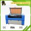 jinan factory supply economical high quality mini reci nonmetal co2 laser cutting machine leather embossing machine