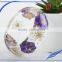 Pine needles inside transparent clear acrylic bangle stand