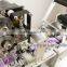 Semi automatic round bottle self adhesive labeling machine with fight coding printer
