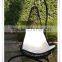 Outdoor patio handwoven black swing hanging chair with white cushions