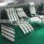 Folding beach chair with headrest