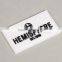 Black-white silicon plastic tag with prominent letters logo for leather gloves