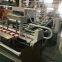 Industrial Carton Folder Gluer with Integrated Strapping Unit