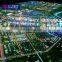 Scale model city handmade digital marketing screens for real estate