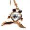 features a large crystal and two black microset crystals 18K gold earring
