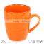 Antique orange color glazed stoneware china ceramic mug