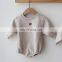 The new baby jumpsuit autumn cotton loose climbing clothes male baby romper bag fart clothes baby triangle jumpsuit