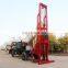 Tractor mounted water well drilling rig