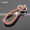 Hot Sale Manual Hand Braided Rope Silver Round Metal Tag Braided Leather Cord Brown Leather Straps Keychain With Braid Leather