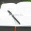white pu full cover embossed logo notebook with orange elastic band