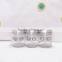 transparent square glass jar with wooden cover