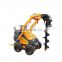 mini digger with auger like Dingo