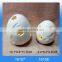 Hollow ceramic egg statue with LED light