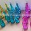 glass wine bottle candle holder with LED string lights