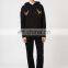 Black embroidered lace up neck and kangaroo pocket hoodie