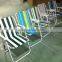 Folding tubular metal chair