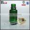 30ml  best seller cosmetic glass bottle with basket dropper cost price essential oil green glass dropper bottle wholesale