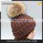 Wholesale latest UK style acrylic crochet hat with raccoon fur poms knit hat