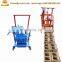 Small Scale Manual Concrete Hollow Brick Block Making Machine Price