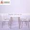 White panel steel bracket dining table