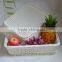 White rectangular PP rattan display basket in supermarket