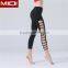 Fitess yoga clothing womens capri pants with square holes on legs in plain color