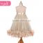 The ivory color girls boutique dress with fluffy feather
