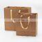 Luxury custom printing design bulk kraft shopping paper gift bag wholesale