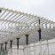Structural steel warehouse with white fireproof painted steel frame