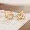 New Brand Design Hollow Out Flower Bow Stud Earrings With Shiny Crystal Simple Metal Ear for Women Earrings Jewelry
