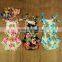 Wholesale floral newborn baby girl pom pom romper M6082510