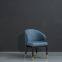 Люкс-уphолstered dining chair with a modern fabric cushion and a wooden leg frame
