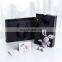 High quality clothing presents in black cardboard boxes