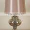Finland chrome base bedside table lamp with electroplate lampstand and off-white barrel shade