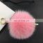 Handmade fox fur ball keychain with leather strap