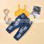 New children's clothing solid color sling striped top + European and American wind hole open bag jeans kids suit