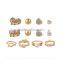 Cheapest price gold plated zinc alloy rhinestone 8 pieces ring earring jewelry set                        
                                                                                Supplier's Choice