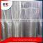 Vibrating architectural crimped metal wire mesh