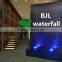 indoor project decorative waterfall with company logo