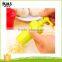 Small plastic tool for mashing garlic