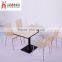 Black and white woodd dining table