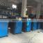 Dryer material hoppers and material conveying systems and snakes and ladder materials