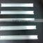 Aluminum and galvanized steel film lock channel and spring
