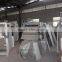 Paper mill waste sludge dehydrator